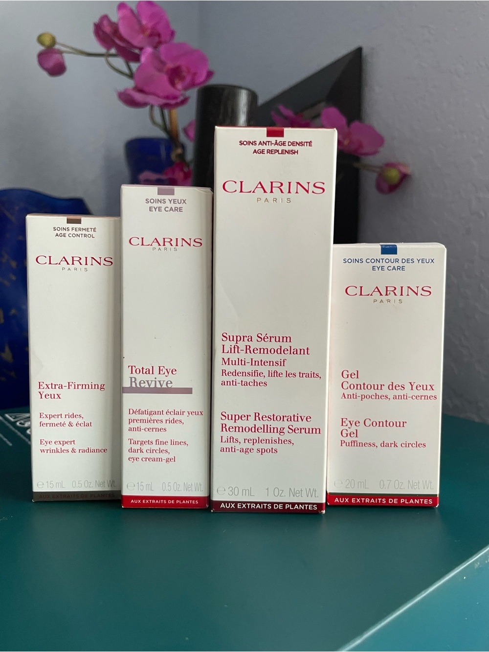 Clarins Eye Care Collection — White Boxes with Red Accents